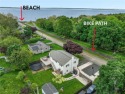 Water views! Walk to the water and enjoy the neighborhood beach for sale in North Kingstown Rhode Island Washington County County on GolfHomes.com