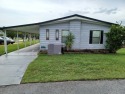 Come settle down and relax in a beautiful manufactured home with for sale in Orlando Florida Orange County County on GolfHomes.com