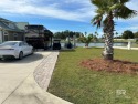 Experience the best of Gulf Coast resort living at Lake Osprey! for sale in Elberta Alabama Baldwin County County on GolfHomes.com