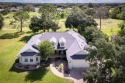 Welcome to 557 Dowling Circle, a stunning residence nestled in for sale in Lady Lake Florida Lake County County on GolfHomes.com