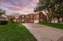 Experience resort-style living every day in this stunning for sale in Rowlett Texas Dallas County County on GolfHomes.com