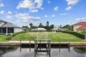 Welcome to coastal living! This stunning waterfront lot features for sale in Stuart Florida Martin County County on GolfHomes.com