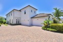 Welcome to Boca Flores, built in 2020! This magnificent for sale in Boca Raton Florida Palm Beach County County on GolfHomes.com