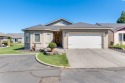 Custom scenic golf course home with stunning upgrades designed for sale in Pasco Washington Franklin County County on GolfHomes.com