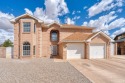 Beautifully upgraded 4BR/4BA brick home on a cul-de-sac corner for sale in Albuquerque New Mexico Bernalillo County County on GolfHomes.com