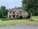 WELCOME HOME! TERRIFIC HOME ON THE CLUBHOUSE SIDE OF WOODMONT for sale in Canton Georgia Cherokee County County on GolfHomes.com