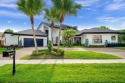 Welcome to this exceptional one-story estate in the highly for sale in Boca Raton Florida Palm Beach County County on GolfHomes.com