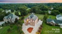 Experience luxury and privacy on over an acre in Mooresville's for sale in Mooresville North Carolina Iredell County County on GolfHomes.com