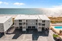 This oceanfront beach home is ready for you to enjoy, just in for sale in Oak Island North Carolina Brunswick County County on GolfHomes.com