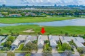 Coveted Bear Island location in features serene golf and lake for sale in West Palm Beach Florida Palm Beach County County on GolfHomes.com