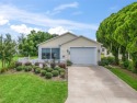 NO BOND!!  Water View!  This cozy Patio Villa is move in for sale in The Villages Florida Lake County County on GolfHomes.com