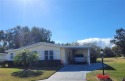 MOTIVATED SELLER FOR This 2-bedroom 2 bath home in Zellwood for sale in Zellwood Florida Orange County County on GolfHomes.com