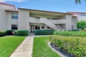 Step inside this light & bright condo to find yourself in a for sale in Boynton Beach Florida Palm Beach County County on GolfHomes.com