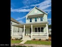 Welcome to 6 Skipperling Lane, a charming three-bedroom, 3 for sale in Okatie South Carolina Beaufort County County on GolfHomes.com