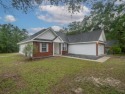 Welcome to this beautifully maintained 3-bedroom, 2-bathroom for sale in Crawfordville Florida Wakulla County County on GolfHomes.com
