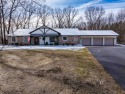 Beautifully updated, sprawling ranch situated on 2.73 acres for sale in Oneida Wisconsin Brown County County on GolfHomes.com