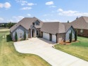 Gorgeous home located on the 15th hole of Cimarron National Golf for sale in Guthrie Oklahoma Logan County County on GolfHomes.com