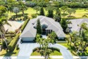 This expansive, custom-built estate offers luxurious for sale in Boca Raton Florida Palm Beach County County on GolfHomes.com