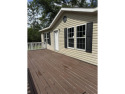 Recently moved to this lot, this beautifully 2015 manufactured for sale in Crawfordville Florida Wakulla County County on GolfHomes.com