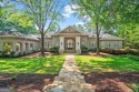 Tucked within the coveted gates of Country Club of the South for sale in Alpharetta Georgia Fulton County County on GolfHomes.com