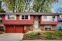 Spacious 4 bedroom, 2 full bathroom raised ranch.  Hardwood for sale in Mount Prospect Illinois Cook County County on GolfHomes.com