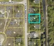 Attractive residential parcel along a canal. Close proximity to for sale in Lehigh Acres Florida Lee County County on GolfHomes.com