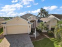 Welcome to this WATERFRONT 3/2 LANTANA model home with for sale in Lady Lake Florida Sumter County County on GolfHomes.com