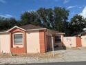 LOCATION! LOCATION! LOCATION!  This courtyard villa home is a for sale in The Villages Florida Sumter County County on GolfHomes.com