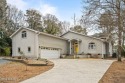 Welcome to 121 Coots Trail, situated on a private cul-de-sac for sale in Hampstead North Carolina Pender County County on GolfHomes.com