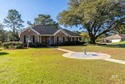Welcome to this spacious home located in a mature neighborhood for sale in Fairhope Alabama Baldwin County County on GolfHomes.com