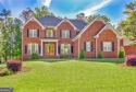 Welcome to this stunning 4-side brick home nestled in the highly for sale in Newnan Georgia Coweta County County on GolfHomes.com