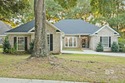 Welcome to this elegant 4-bedroom, 3-bath home located in the for sale in Spanish Fort Alabama Baldwin County County on GolfHomes.com