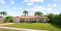 Discover coastal elegance in this beautifully remodeled Home on for sale in Marco Island Florida Collier County County on GolfHomes.com