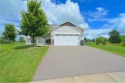 Nestled at the end of a cul-de-sac adjoining a picturesque golf for sale in Foley Minnesota Benton County County on GolfHomes.com