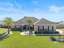 Elegant Brick Ranch with Resort-Style Backyard Oasis. Welcome to for sale in Gulf Shores Alabama Baldwin County County on GolfHomes.com