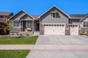 This is a WOW home! Pride of ownership shows in this semi-custom for sale in Windsor Colorado Weld County County on GolfHomes.com