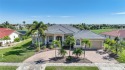 Stunning former model home located on the Twin Isles golf course for sale in Punta Gorda Florida Charlotte County County on GolfHomes.com
