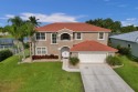 Prepare to be captivated by this newly remodeled five-bedroom for sale in Lake Worth Florida Palm Beach County County on GolfHomes.com