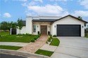 Stunning 2024 custom-built home sits on a desirable corner lot for sale in Edinburg Texas Hidalgo County County on GolfHomes.com