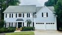 This updated and well-kept home is situated in the desirable for sale in Woodstock Georgia Cherokee County County on GolfHomes.com