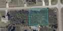 Oversized half acre lot.  Includes 2 building lots.  Located for sale in Lehigh Acres Florida Lee County County on GolfHomes.com