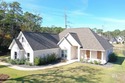 Discover exceptional coastal living in this stunning 3-bedroom for sale in Gulf Shores Alabama Baldwin County County on GolfHomes.com