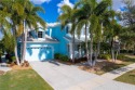 Welcome to your dream waterfront oasis in the prestigious for sale in Apollo Beach Florida Hillsborough County County on GolfHomes.com