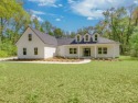 Exquisite new construction overlooking hole 6 of the new, state for sale in Crawfordville Florida Wakulla County County on GolfHomes.com