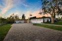 Welcome to 5491 Rockledge Drive, an exquisitely redesigned for sale in Buena Park California Orange County County on GolfHomes.com