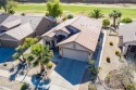 Picture yourself lounging on the expansive back patio, gazing for sale in Casa Grande Arizona Pinal County County on GolfHomes.com