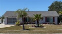 Charming and updated 2-bedroom, 1-bath, 1-car garage home on an for sale in Port Charlotte Florida Charlotte County County on GolfHomes.com