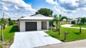 2022 Built 2/2/1 CBS with a metal roof.  The  home is situated for sale in Fort Pierce Florida Saint Lucie County County on GolfHomes.com