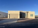 NEWLY COMPLETE CUSTOM HOME, never been occupied! Located on a for sale in Casa Grande Arizona Pinal County County on GolfHomes.com