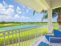 Stunning designer renovation of this two story Victoria Island for sale in Vero Beach Florida Indian River County County on GolfHomes.com